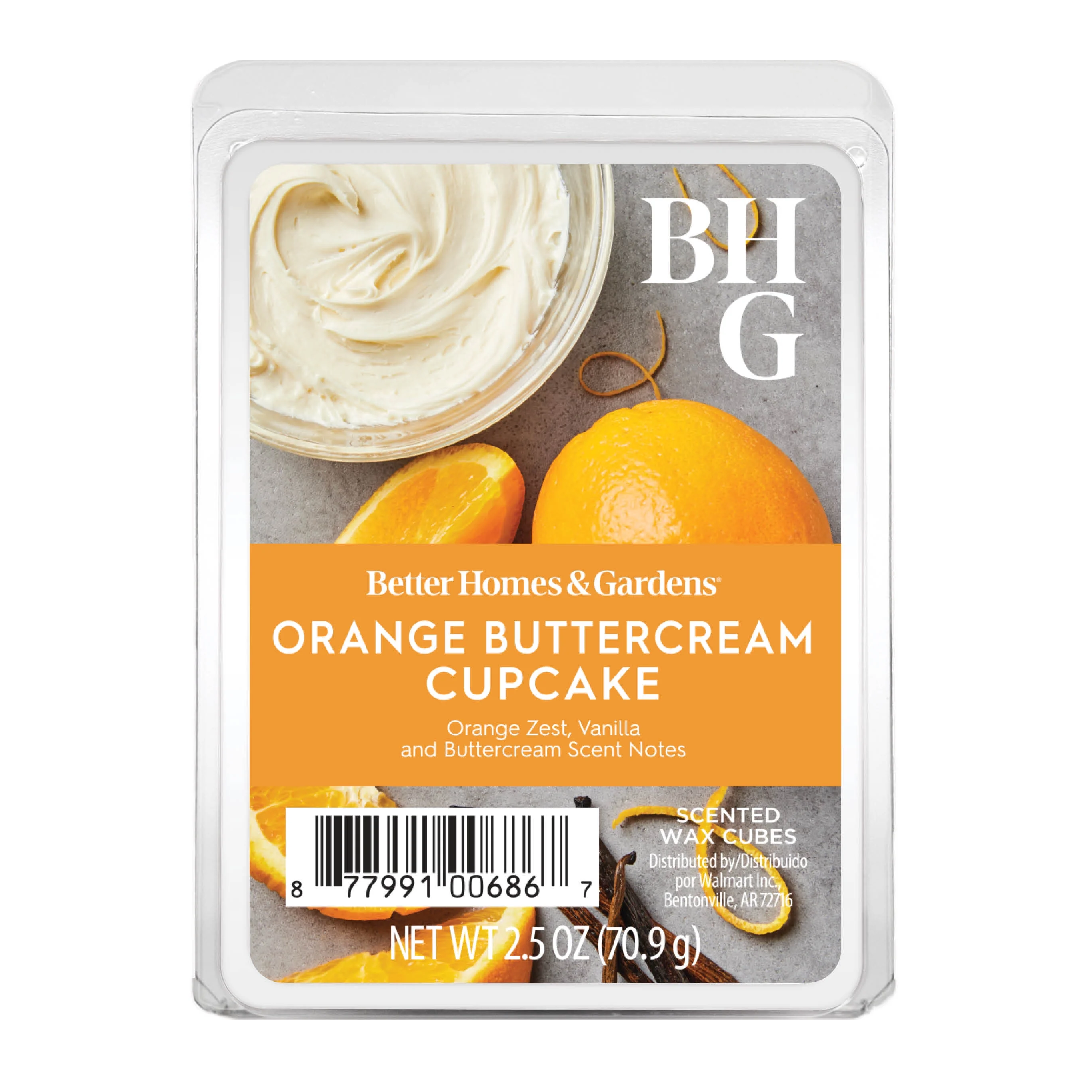 Better Homes & Gardens Orange Buttercream Cupcake scented wax cubes in a clear plastic clamshell package with a white lid, featuring an orange and cream-colored label.
