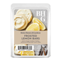 Better Homes & Gardens Frosted Lemon Bars scented wax cubes in a clear plastic clamshell package. The label features images of frosted lemon cookies, sliced lemons, and the BHG logo.