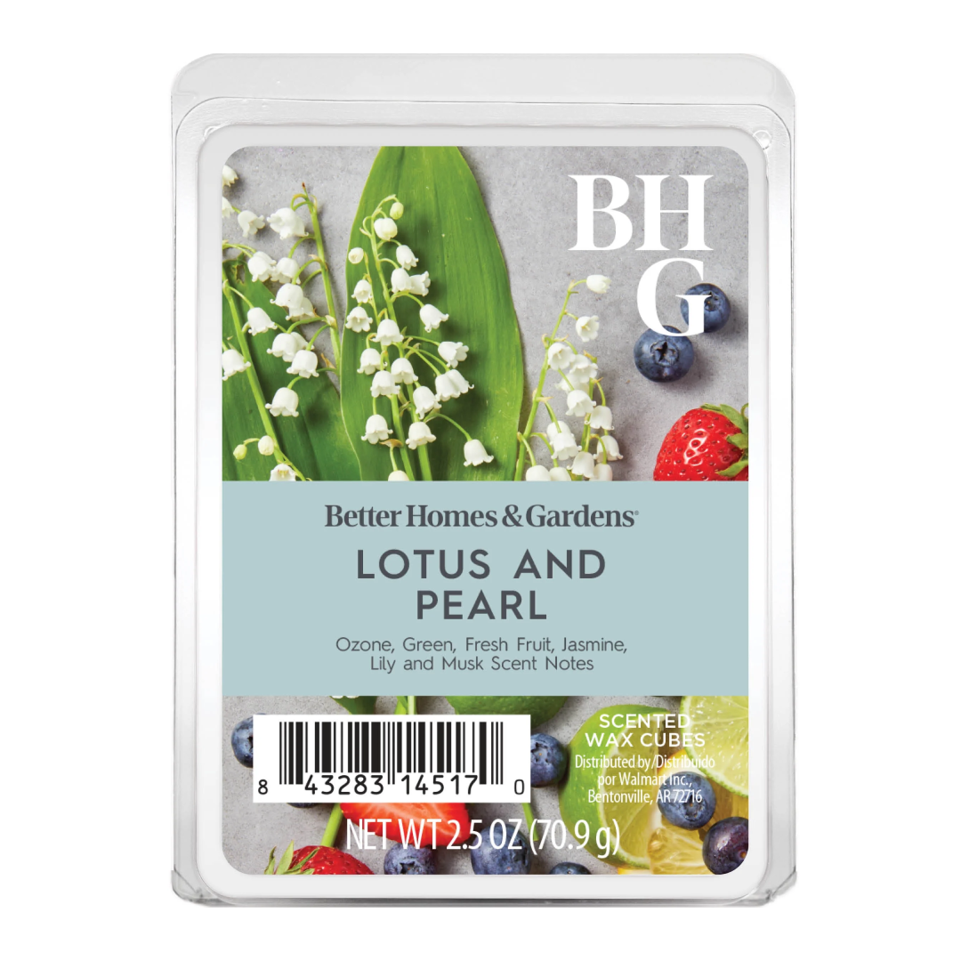 Better Homes & Gardens Lotus and Pearl scented wax cubes in a clear plastic clamshell package with a botanical label showing lily of the valley, blueberries, and strawberries.