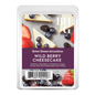Better Homes & Gardens Wild Berry Cheesecake scented wax cubes in a clear plastic clamshell package, featuring a purple label with product details and berry-and-cheesecake imagery.
