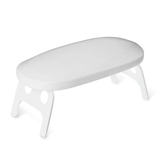 White oval table on a white background