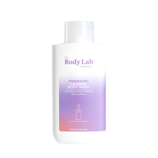 Body wash bottle with 'The Body Lab' branding on a white background