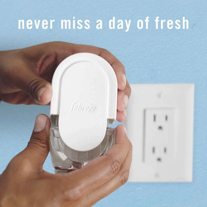Febreze PLUG Starter Kit - Ocean Scented Oil Air Freshener | Warmer + 1 Refill | Fade Defy Odor Fighter