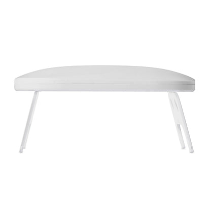 White coffee table with a curved design on a white background
